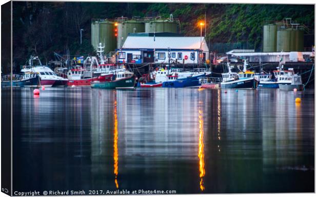 The business end of Portree pier. Canvas Print by Richard Smith