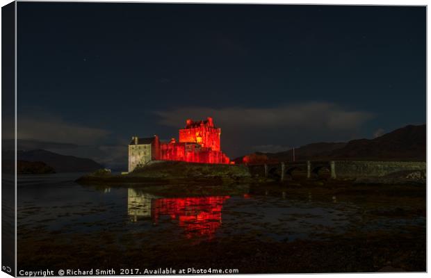 Remembrance day floodlighting at Eilean Donan Cast Canvas Print by Richard Smith