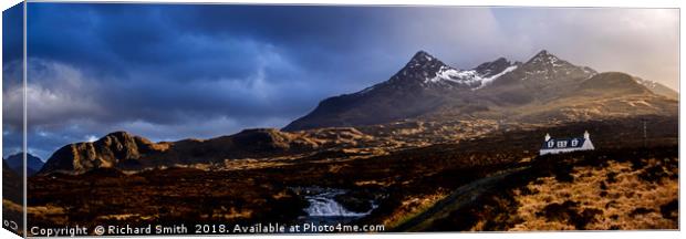 Lone Cuillin cottage and the Black Cuillin Hills  Canvas Print by Richard Smith