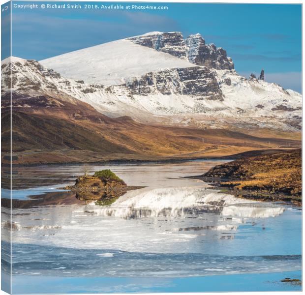The Storr partially reflected in the Storr Lochs Canvas Print by Richard Smith