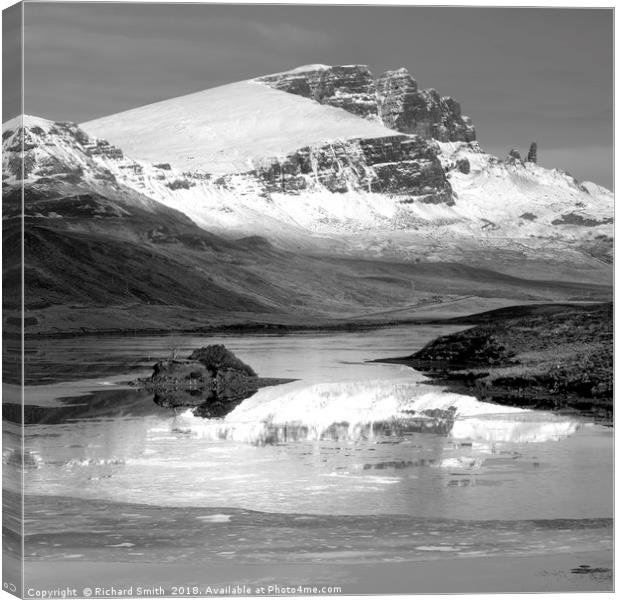 The Storr partially reflected in the Storr Lochs 2 Canvas Print by Richard Smith