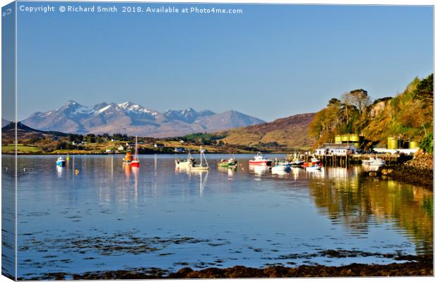 Portree sea loch with yachts and the Cuillin hills Canvas Print by Richard Smith