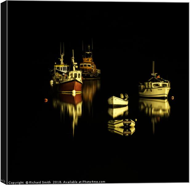 A small group of boats moored on Loch Portree Canvas Print by Richard Smith