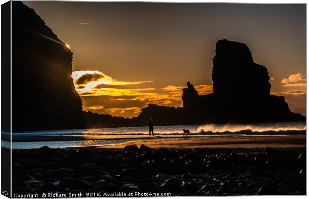 Sun setting behind Talisker Point Canvas Print by Richard Smith