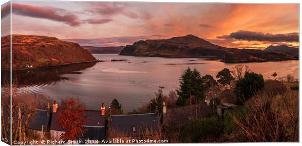 East view over house rooves as the sun goes down  Canvas Print by Richard Smith