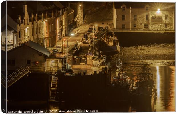 Fishing vessels moored to Portree quay at night Canvas Print by Richard Smith