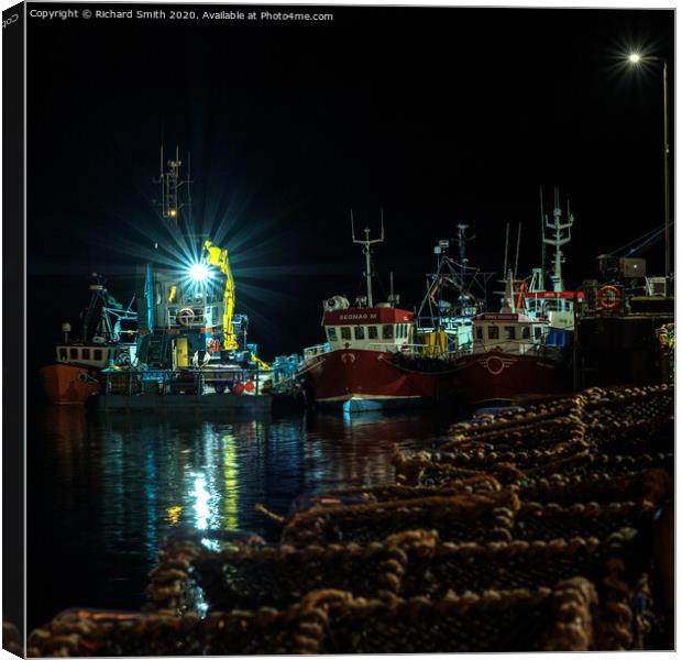 Vessels moored to Portree pier overnight.  Canvas Print by Richard Smith