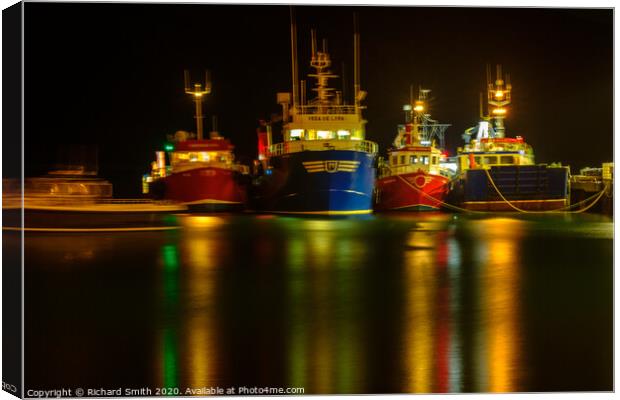 Trawlers with a long exposure, lots of reflections Canvas Print by Richard Smith