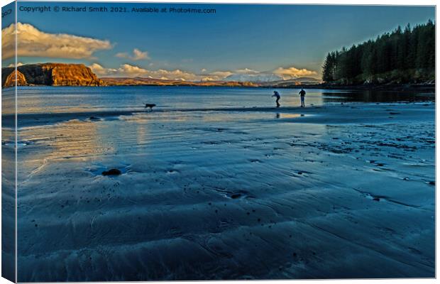 Blue reflections on a wet beach. Canvas Print by Richard Smith