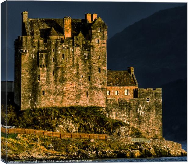 A zoom crop of Eilean Donan Castle from the west.  Canvas Print by Richard Smith