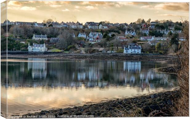 Redcliff House and Scorrybreac House reflected in Loch Portree. Canvas Print by Richard Smith