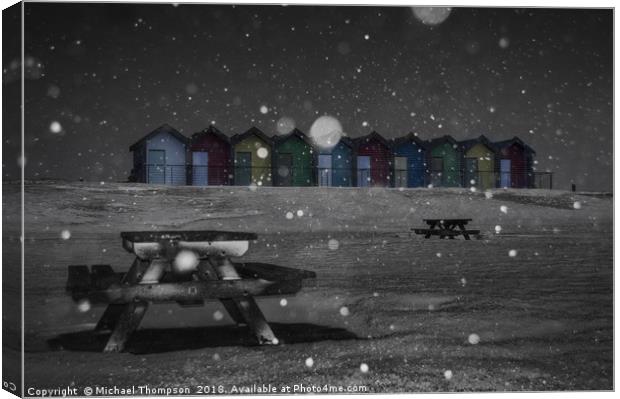Blyth Beach huts snow scene Canvas Print by Michael Thompson