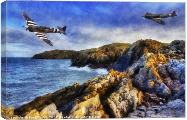 Spitfire On The Coast Canvas Print by Ian Mitchell