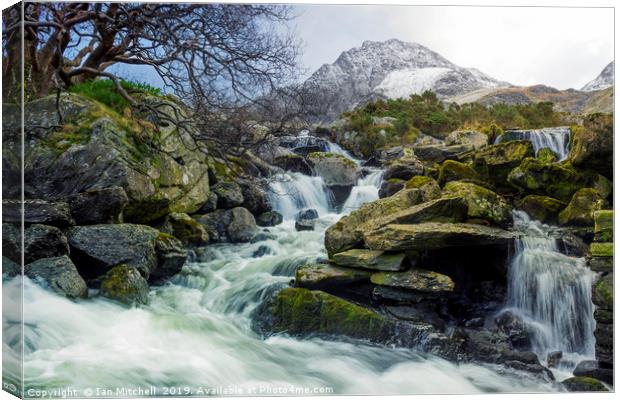 Snow Covered Tryfan Canvas Print by Ian Mitchell