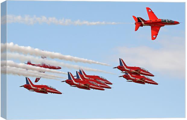 Red arrows break to land Canvas Print by Rachel & Martin Pics