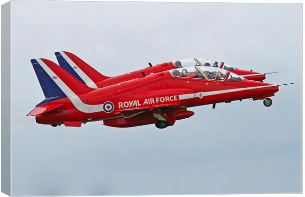 Red Arrows pair takeoff Canvas Print by Rachel & Martin Pics