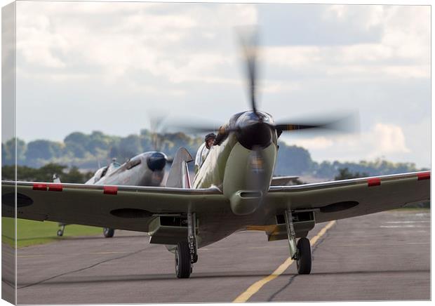 Spitfire pair taxi in - colour version Canvas Print by Keith Campbell