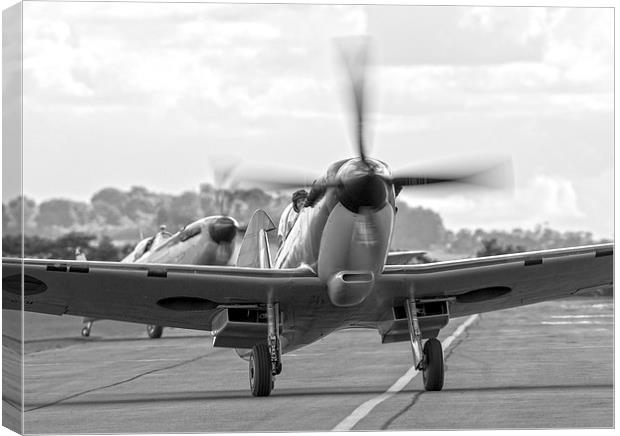 Spitfire pair taxi in - black and white version Canvas Print by Keith Campbell