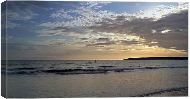 Lone surfer Canvas Print by Carol Young