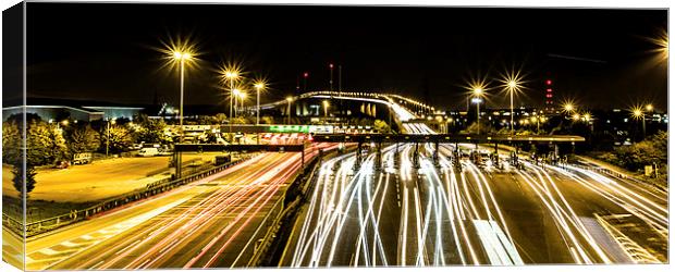 Busy light trails Canvas Print by jim wardle-young