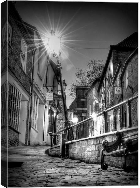  The Leaning Lamp post on steep hill Lincoln  Canvas Print by Jon Fixter