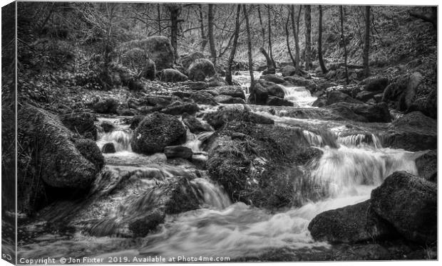 Fast flowing water  Canvas Print by Jon Fixter