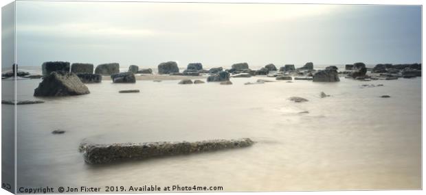 Spurn point Sea defense   Canvas Print by Jon Fixter