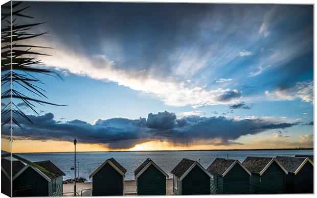 Stormy Sunset at Sea Canvas Print by Ian Johnston  LRPS