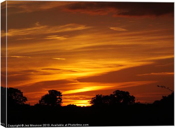 Burning Sunset Canvas Print by Jez Mouncer