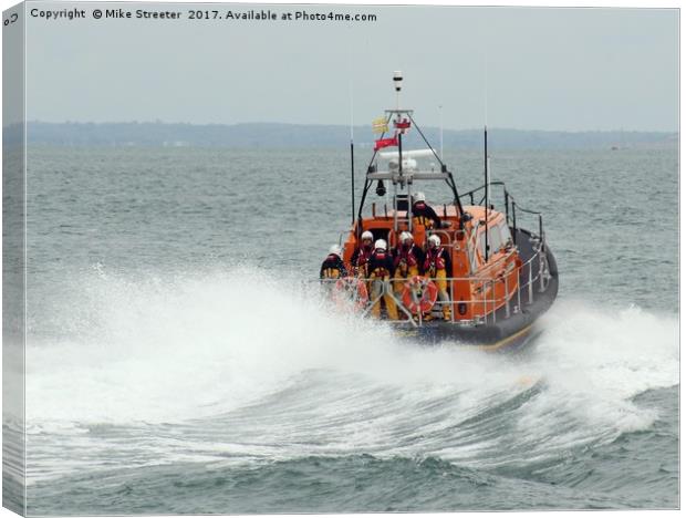 Lifeboat to the rescue. Canvas Print by Mike Streeter