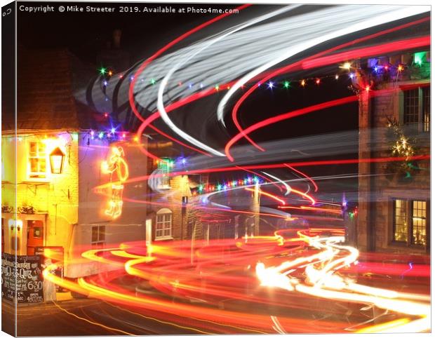 Christmas light trails Canvas Print by Mike Streeter
