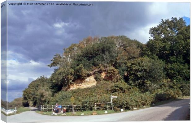 The red cliff at Redcliffe Canvas Print by Mike Streeter