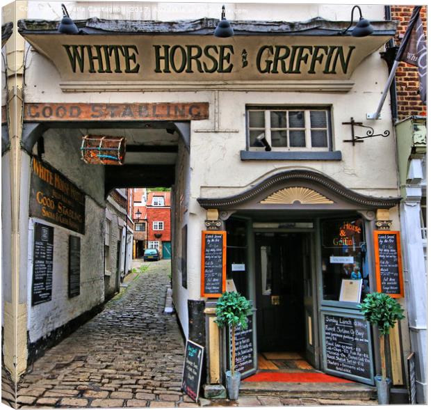 The White Horse & Griffin Inn Canvas Print by Marie Castagnoli