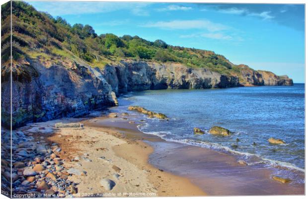 A small hidden little Rocky cove  Canvas Print by Marie Castagnoli