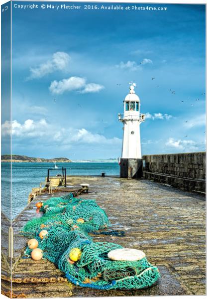 Nets and Lighthouse Canvas Print by Mary Fletcher