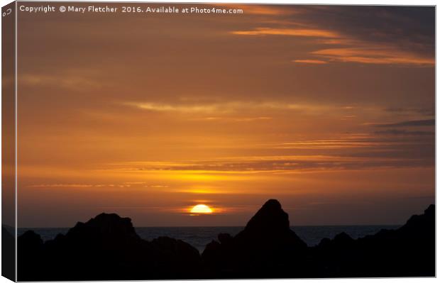 Sunset over Kynance Cove Canvas Print by Mary Fletcher