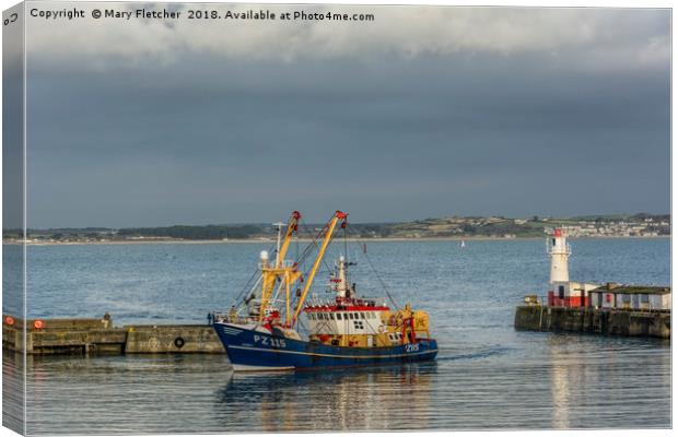 Fishing Boat returns to Newlyn Canvas Print by Mary Fletcher