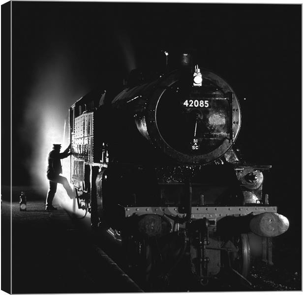 Steam loco fireman climbing aboard Canvas Print by Ian Duffield