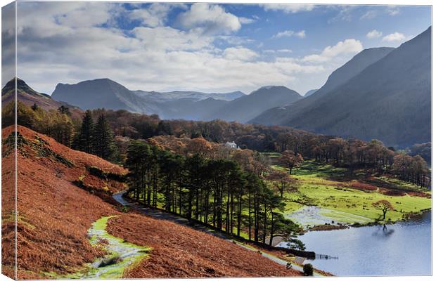  Crummock Water and surrounding hills in Autumn Canvas Print by Ian Duffield