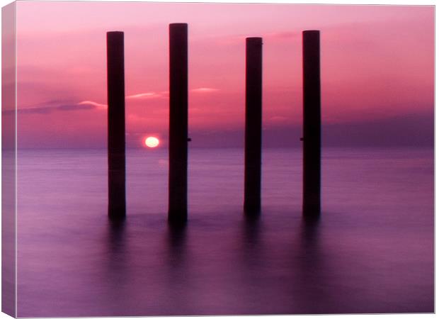 west pier sunset pillars Canvas Print by Terry Busby