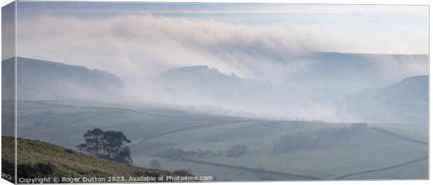 Peak District hills and fields covered with the ro Canvas Print by Roger Dutton