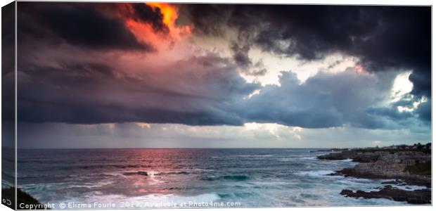 Heavy clouds at sunset Canvas Print by Elizma Fourie