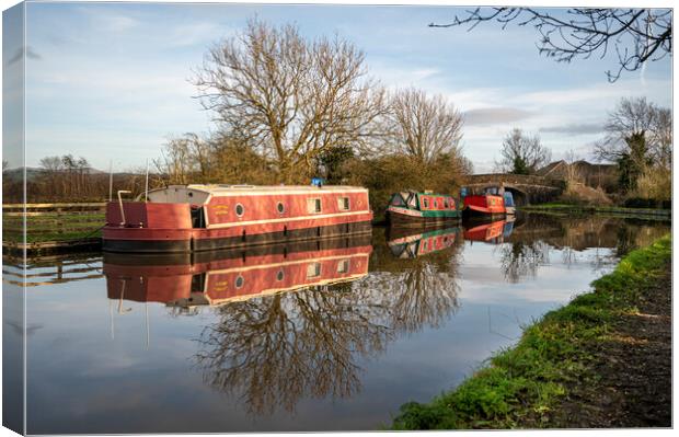 Lovely reflections on the Lancaster Canal Canvas Print by Gary Kenyon