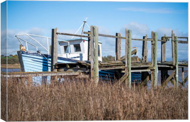 Blue Wooden Boat at the jetty Canvas Print by Gary Kenyon