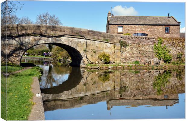 Reflections on the Lancaster Canal At Galgate Canvas Print by Gary Kenyon
