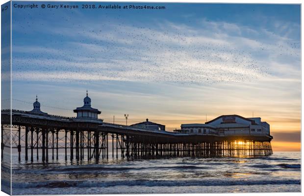 Starlings Over North Pier Canvas Print by Gary Kenyon