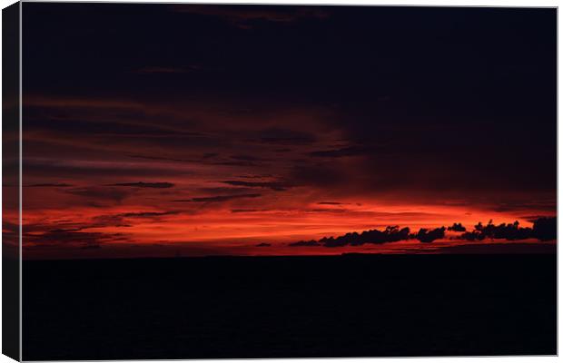 Maldivian Red Sunset Canvas Print by Jon Bryant