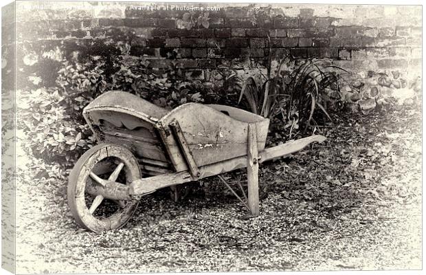  Old wooden wheelbarrow  Canvas Print by Thanet Photos