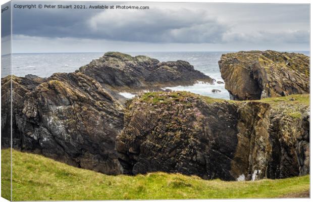 Rocks and Point at the Butt of Lewis Canvas Print by Peter Stuart