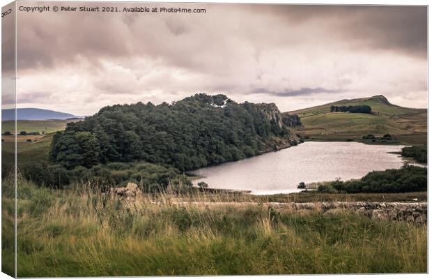 Crag Lough on above Once Brewed on Hadrian's Wall Walk in Northu Canvas Print by Peter Stuart